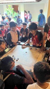 students playing carroms